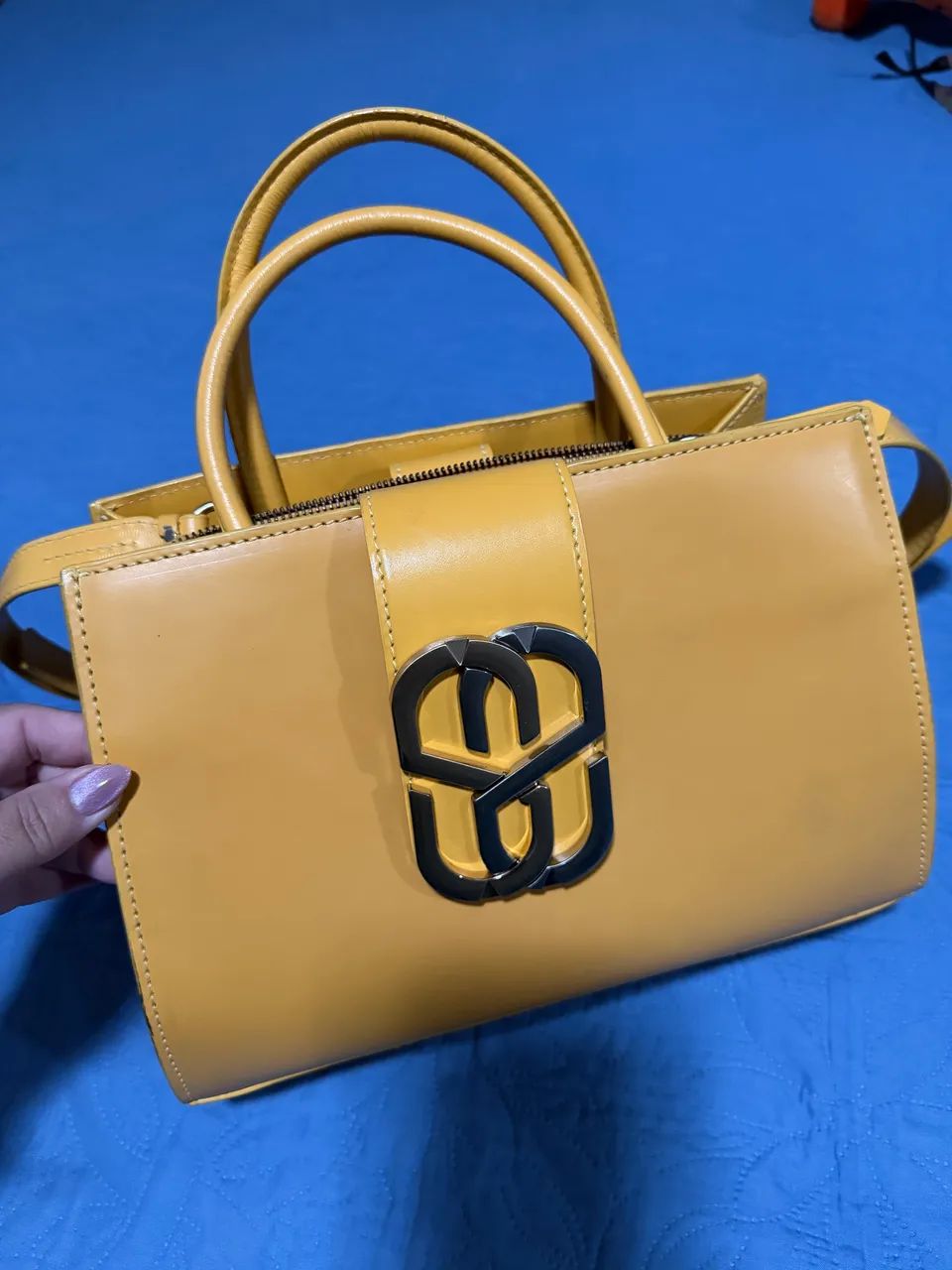 Bolsa Schütz em couro Mostarda