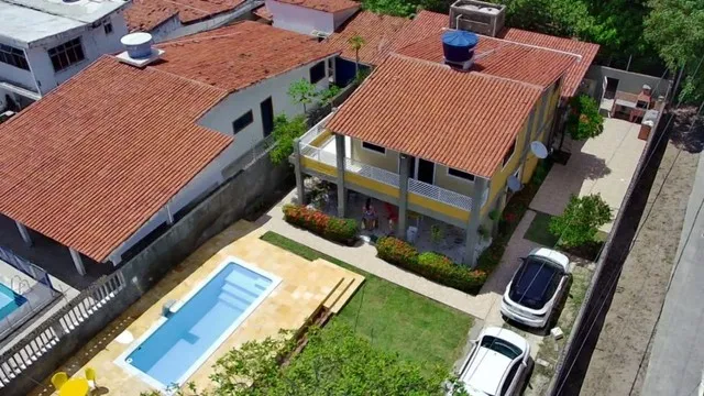 Praia Enseada dos Corais - casa com piscina -5 quartos