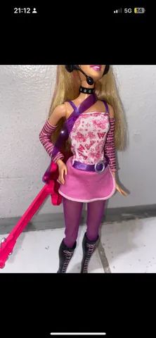 boneca barbie roqueira