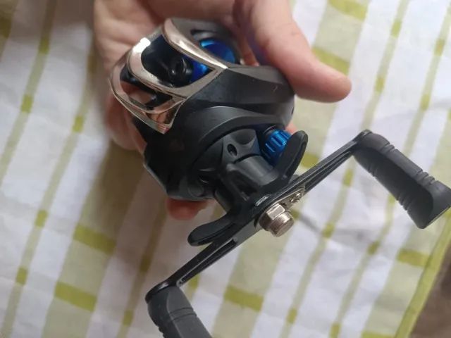 Carretilha para pesca AK200 mão esquerda novo na caixa - Foto 3