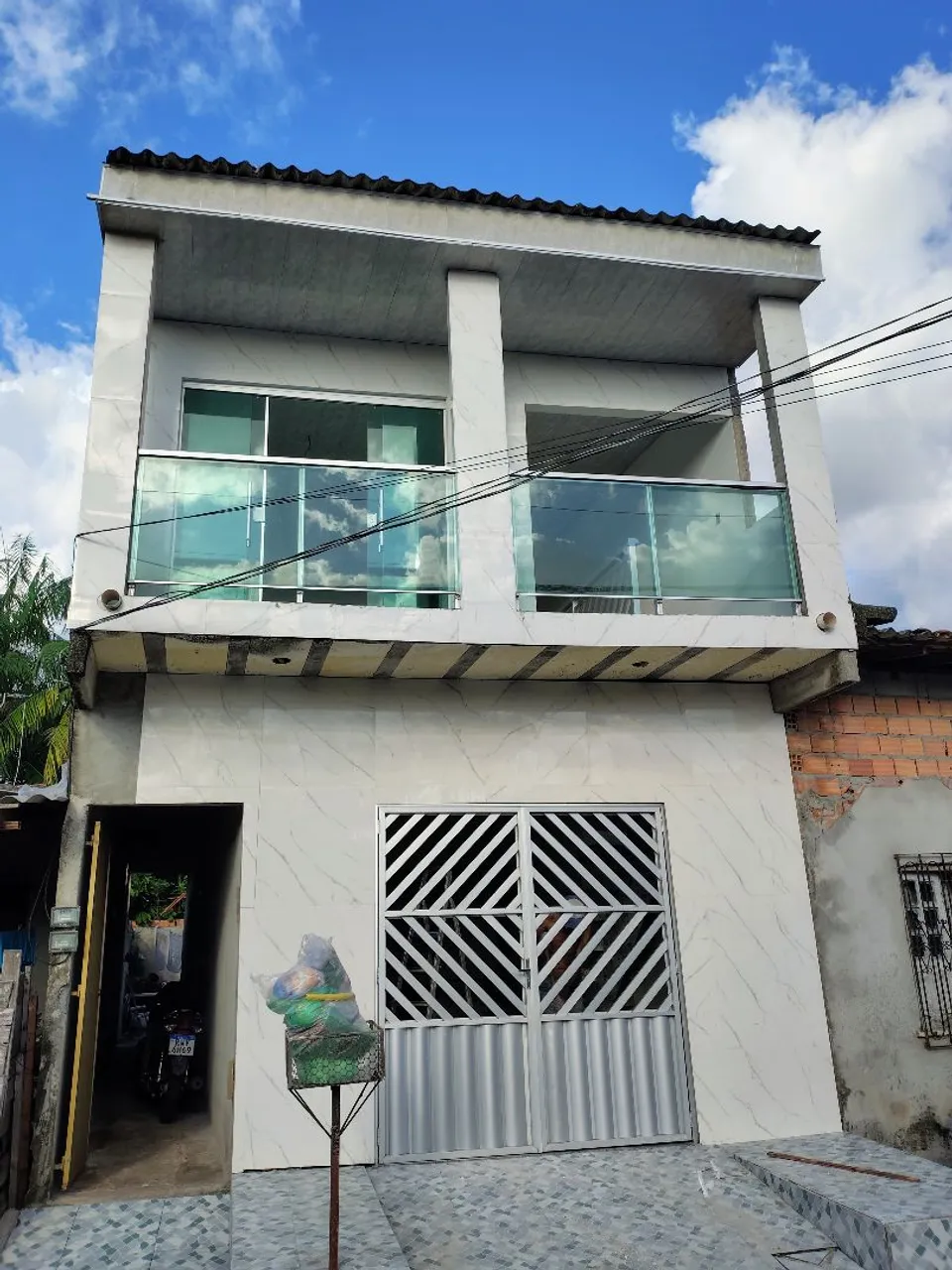 Casa na rua tucano nova 2 pavimento com sacada