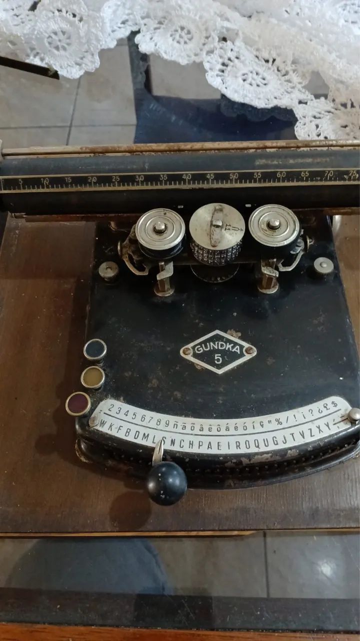 Máquina de escrever 64961542574337120