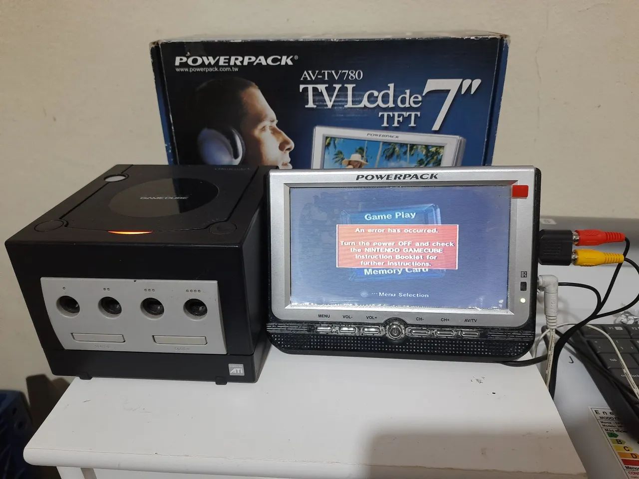 Mini TV Portátil 7" Powerpack na Caixa