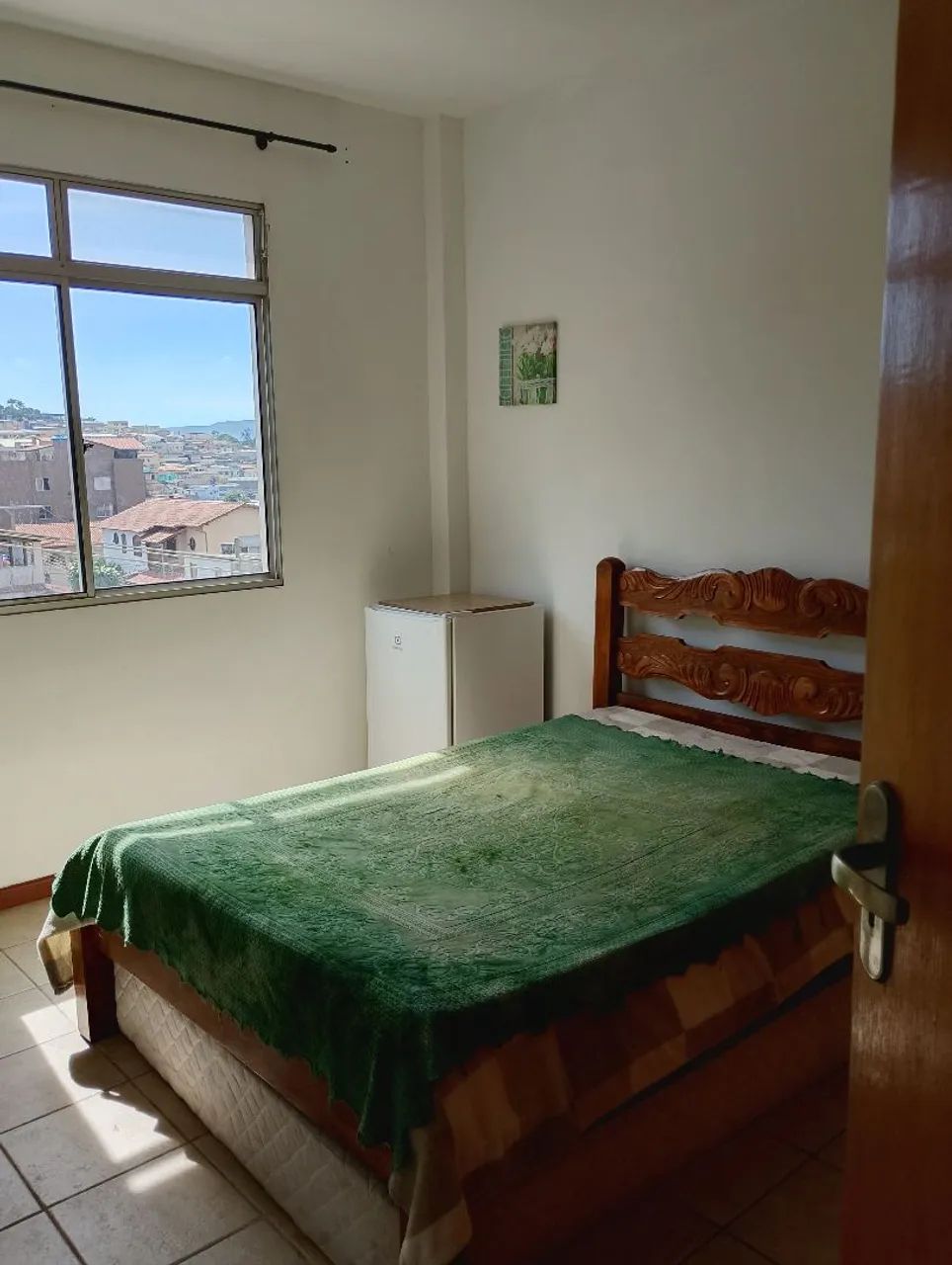Aluguel de quarto com suite e frigobar 