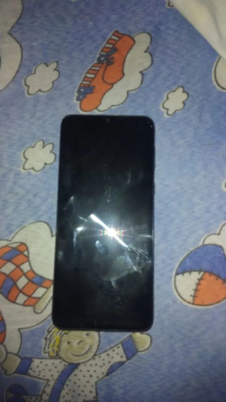 Celular E13