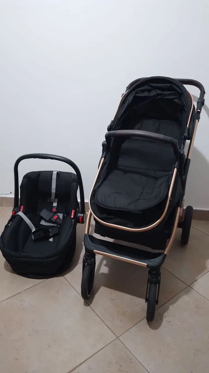 Carrinho de bebê + bebê conforto 