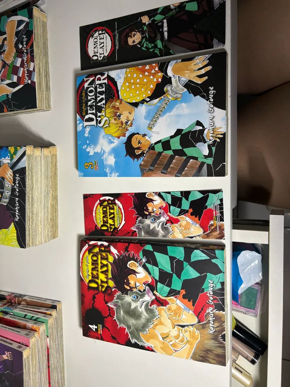 Mangás Demon Slayer volumes 1 a 7, e 9 - Foto 5