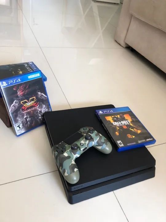 Console ps4 , controle e jogos exclusivos 
