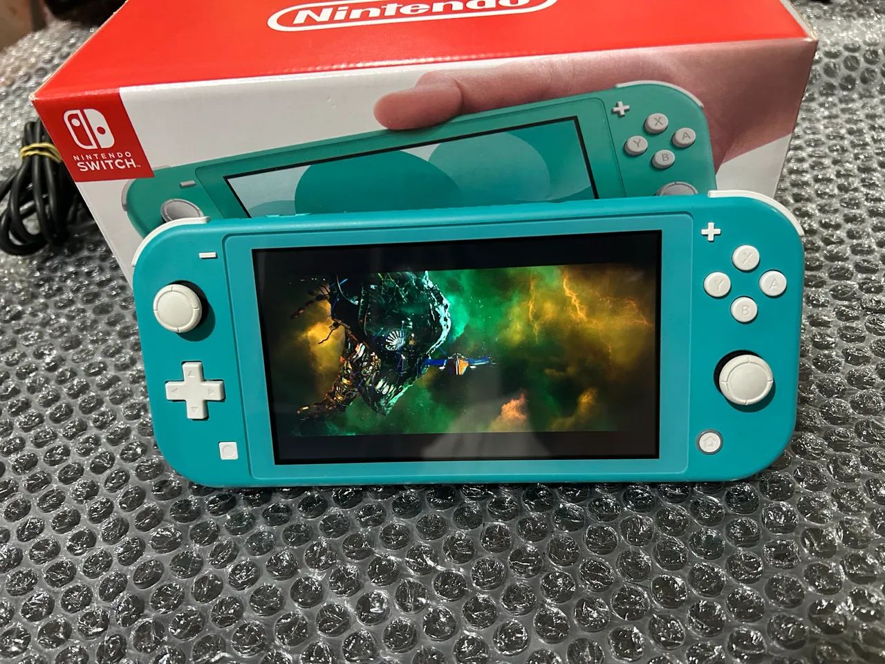 Nintendo Switch Lite completo com jogo - Consoles de Vídeo Game