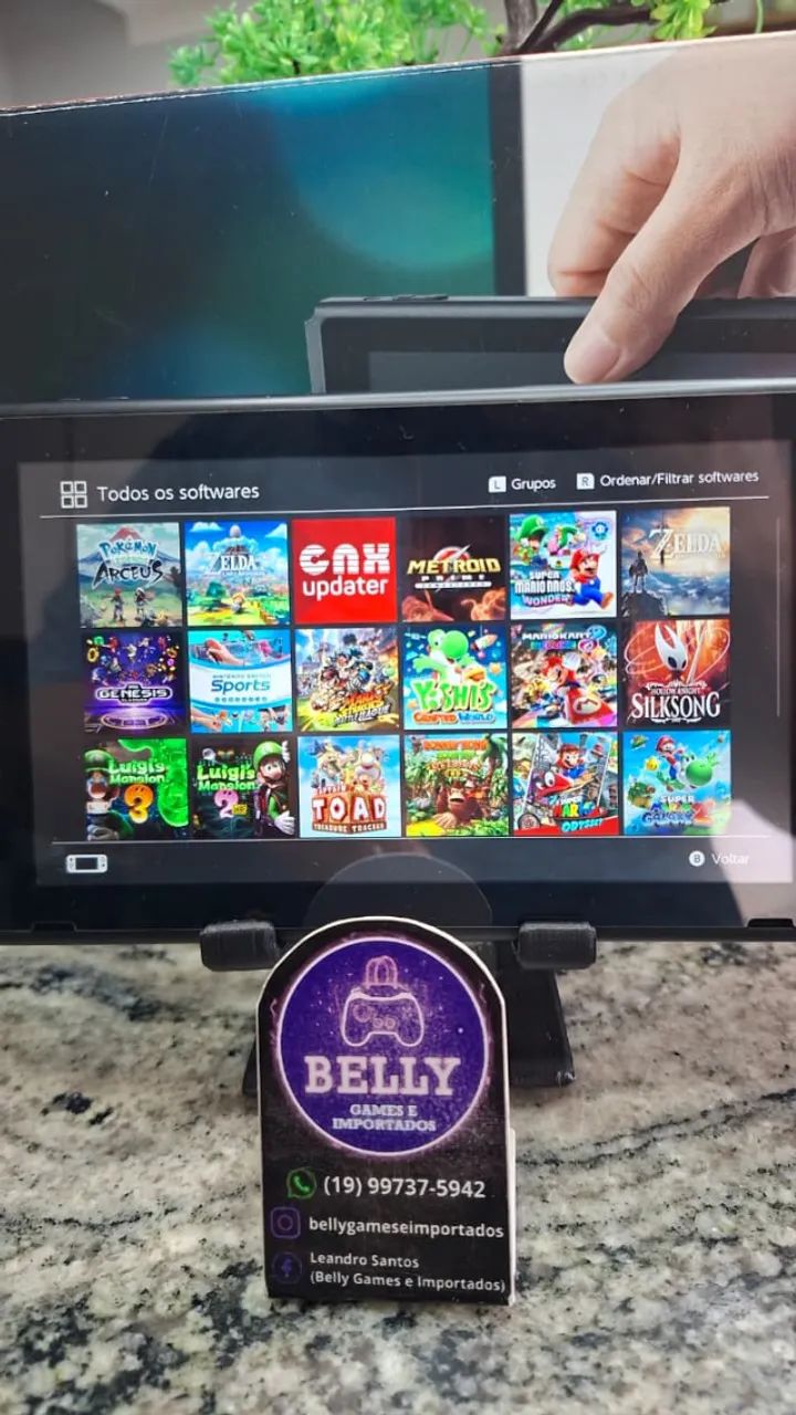 NINTENDO SWITCH DESBLOQUEADO NA CAIXA COM 18 JOGOS - Foto 2