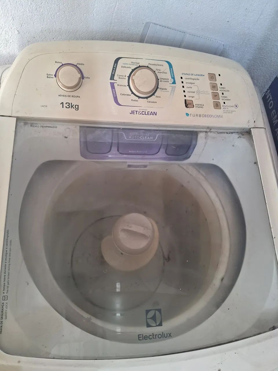 Máquina de lavar com defeito 