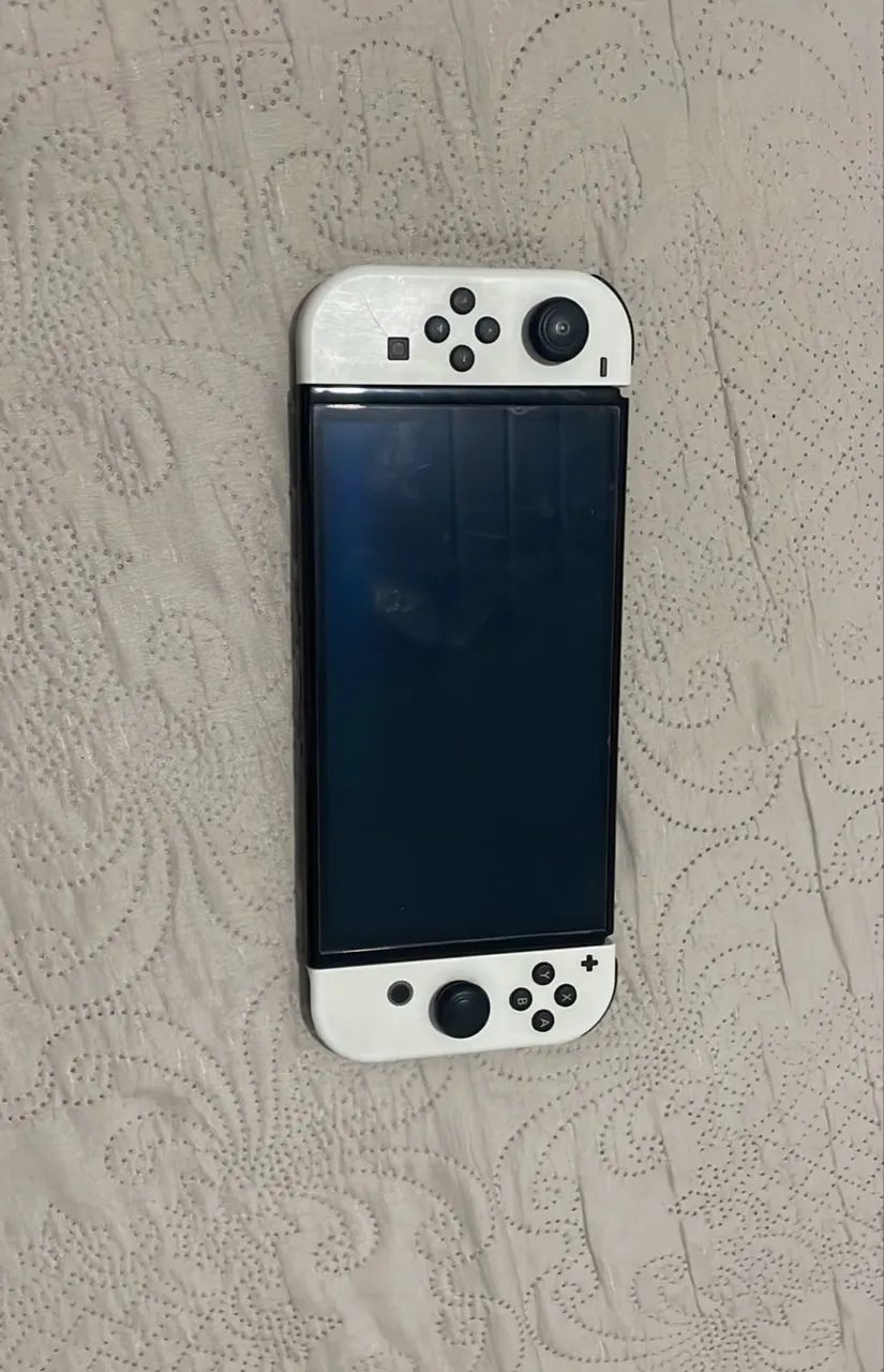 Vendo Nintendo switch oled com 5 jogos + duas cases + película extra - Foto 5
