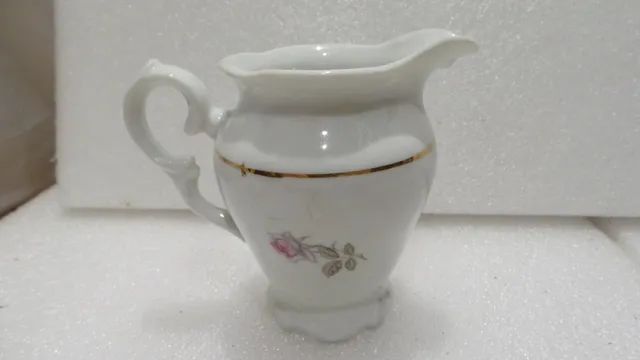 Mini leiteira de porcelana schmidt linda e rara!! medindo 9cm de altura - Foto 5