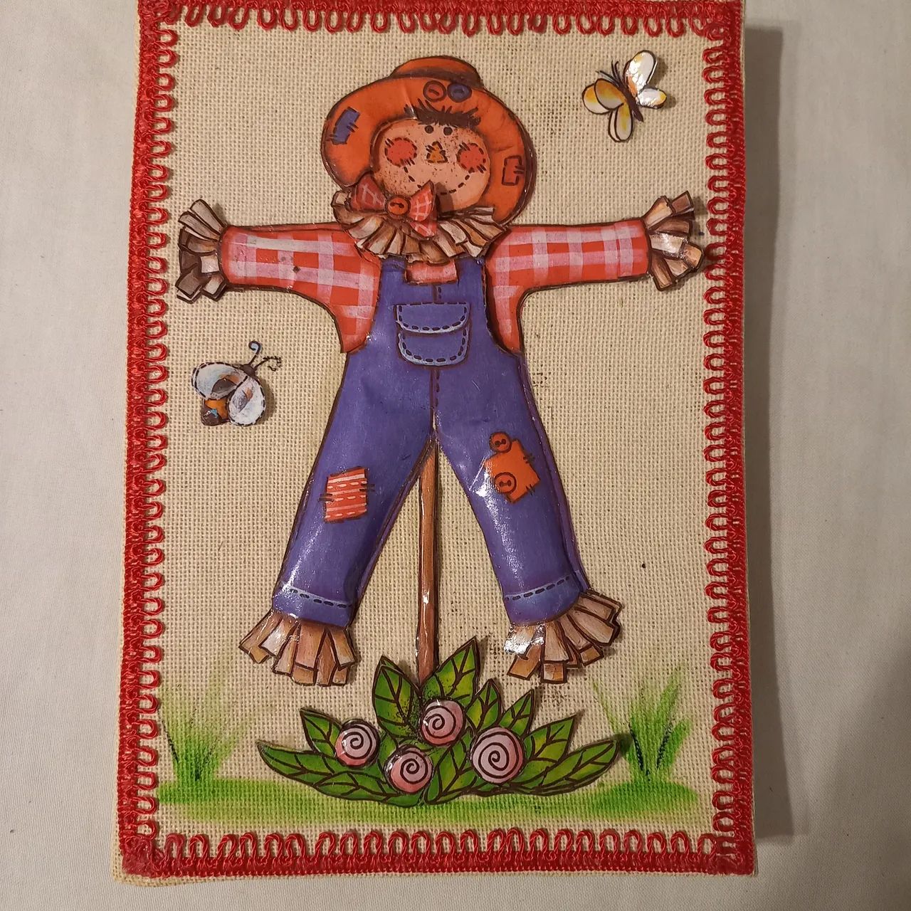 2  cadernos  com  capa feita  de  artesanato