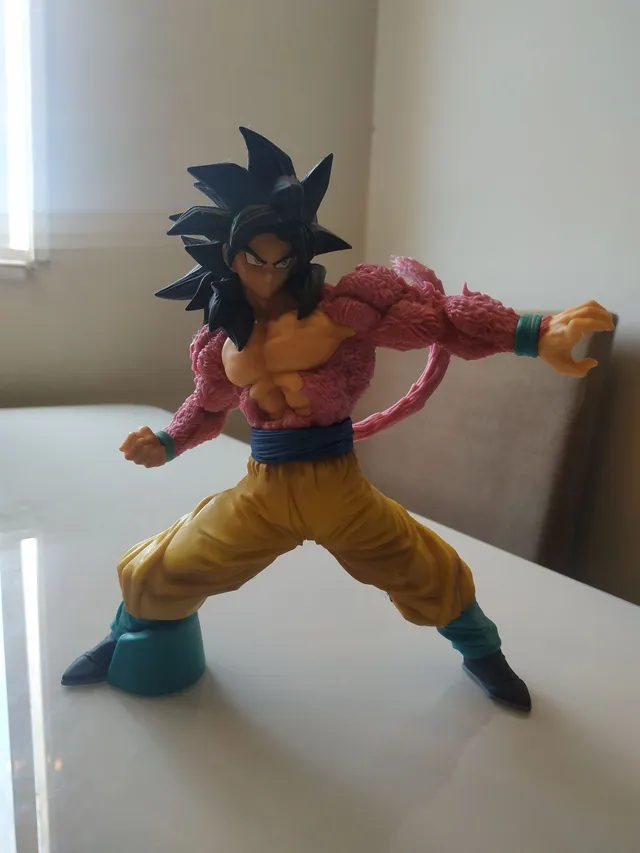 Boneco Goku Deus Articulado