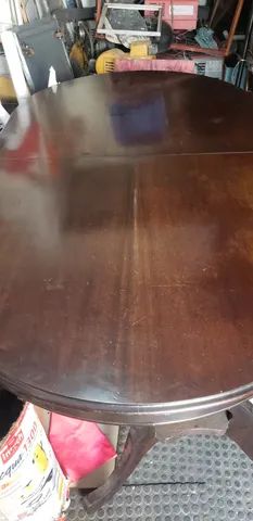 Mesa de madeira oval extensível