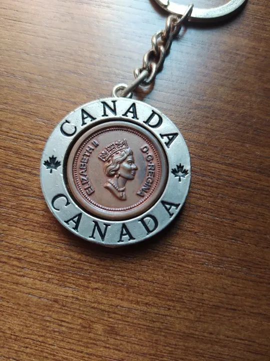 Chaveiro viagem Canadá moeda 1 Cent rainha Elizabeth giratório