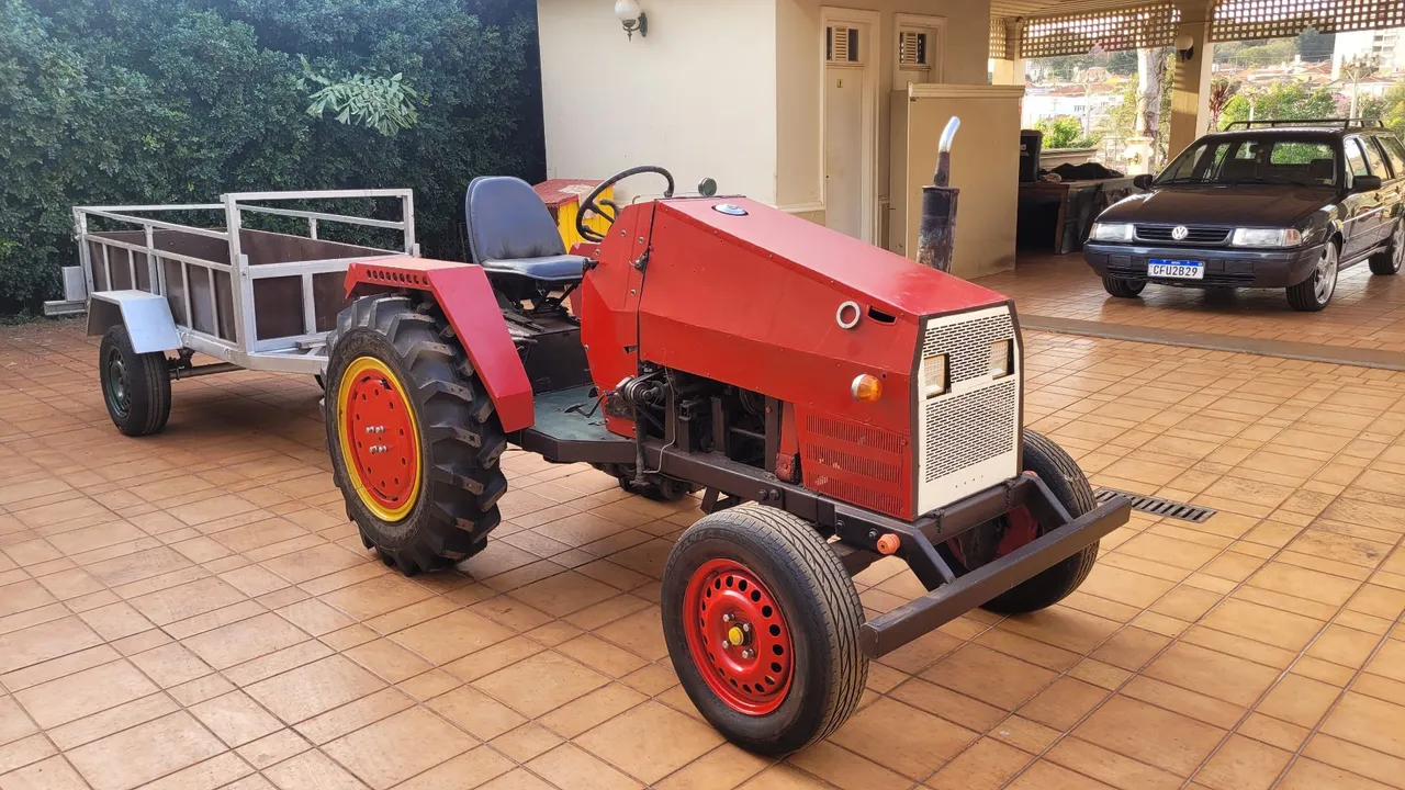 Trator Artesanal com Carreta - Perfeito para suas tarefas!