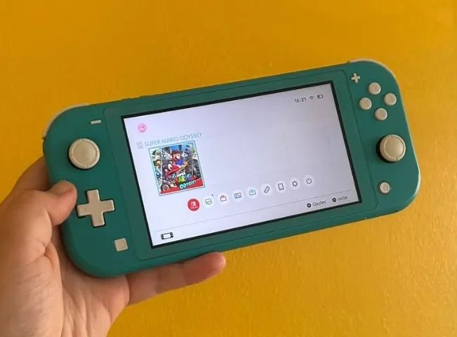 Nintendo Switch Lite Turquesa + Acessórios - Foto 4