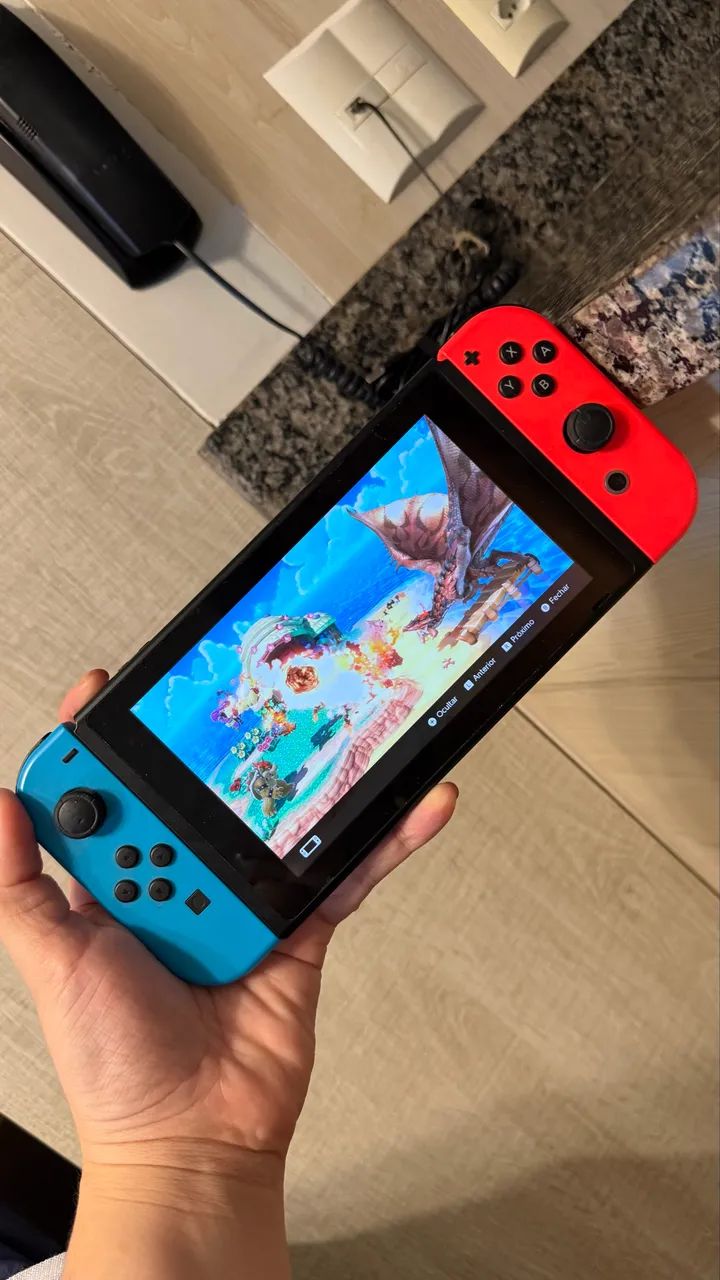 Nintendo Switch com caixa