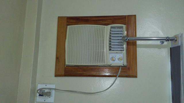 Com moldura de madeira 220 volts