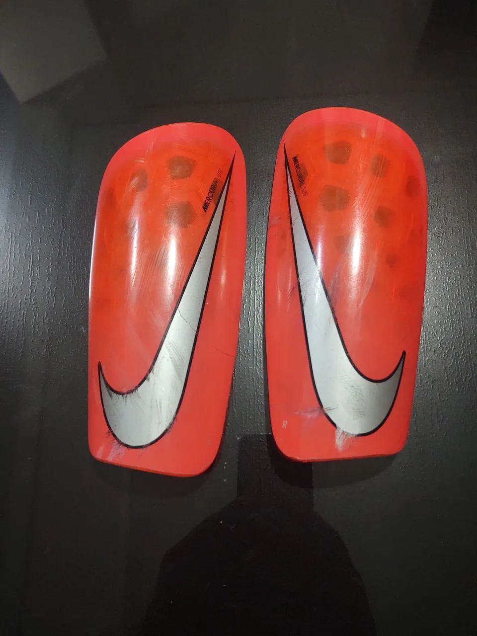 Caneleiras Nike Mercurial Lite - Tamanho Único