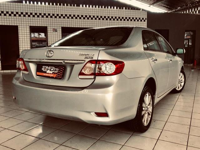 Corola altis 2012 Blindado nível 3 muito novo ac troca - Foto 2