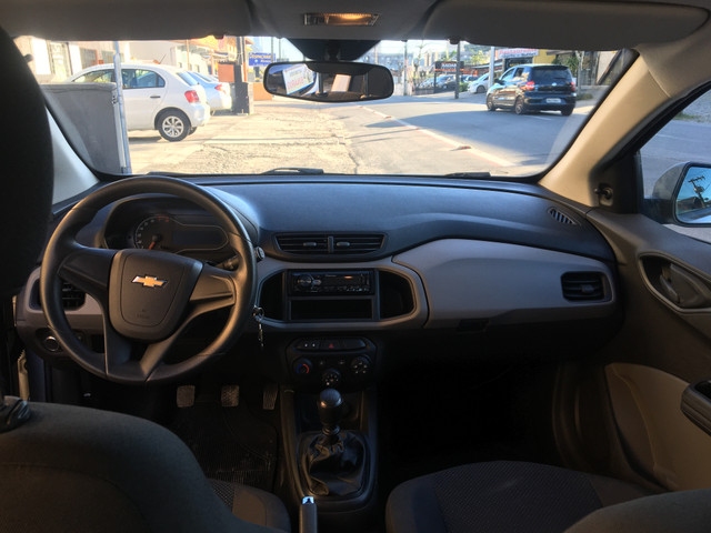 Onix joye 1.0 2017 muito novo km baixo - Foto 7