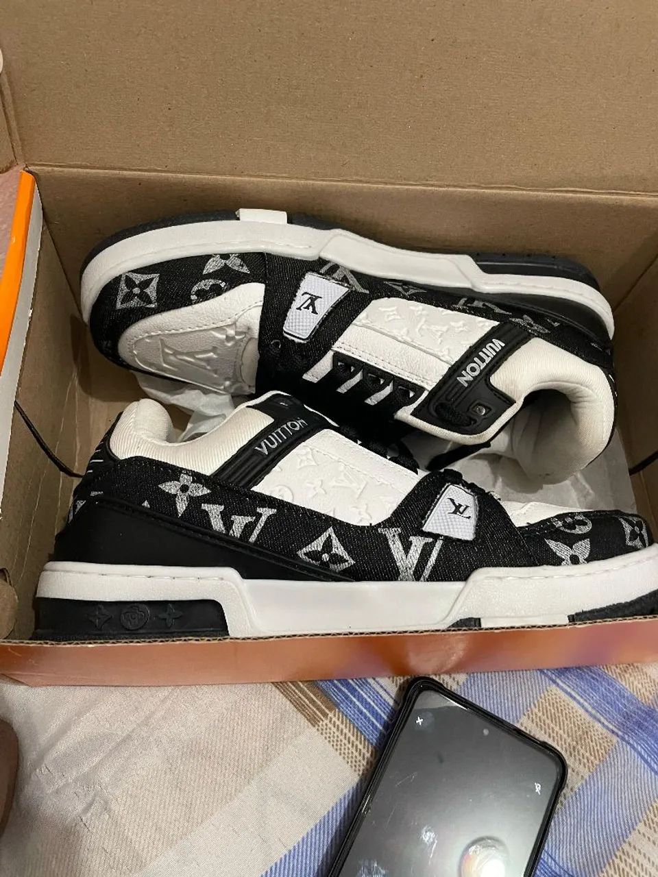 Tênis Louis Vuitton