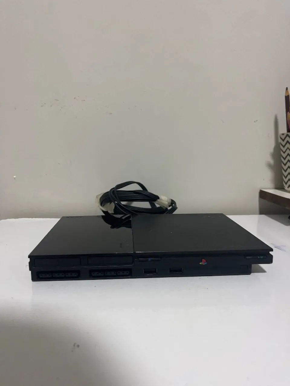 Ps2 com 2 controles em perfeito estado 