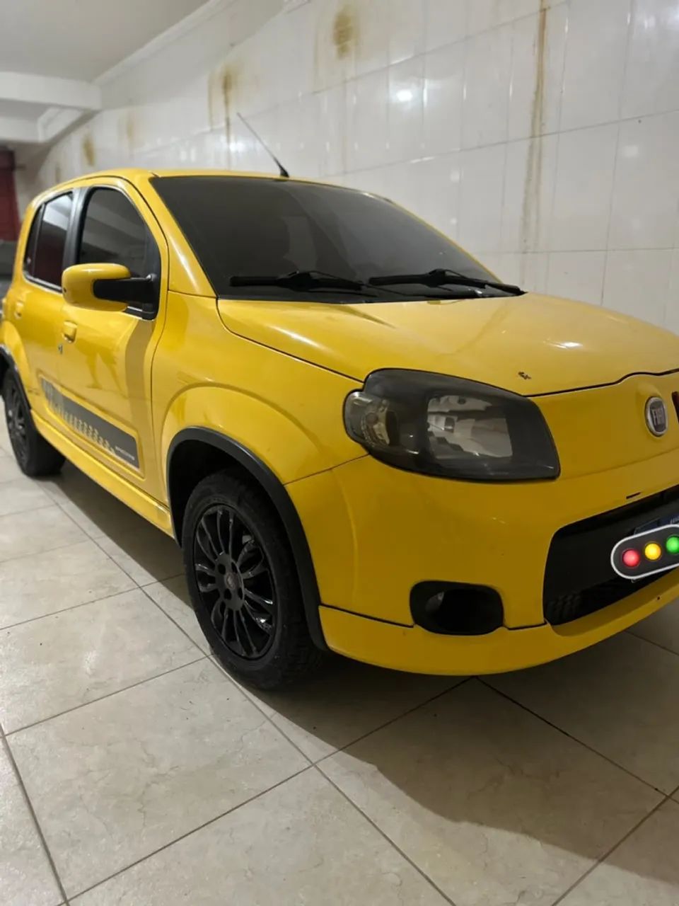 Fiat Uno Sporting 1.4 EVO Fire Flex 8V 4P 2013