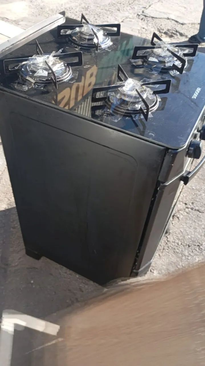 Fogão de 4 bocas automático funcionando perfeitamente valor 450;00 - Foto 5