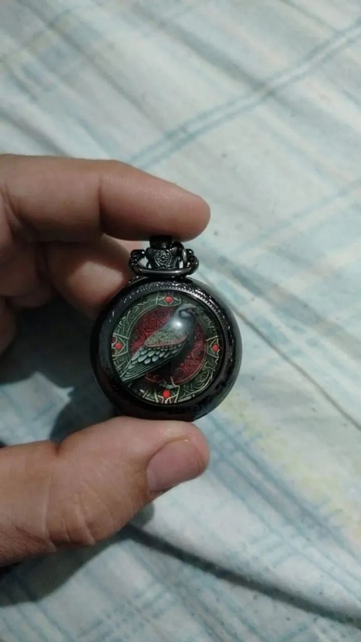 Relogio de bolso de corvo