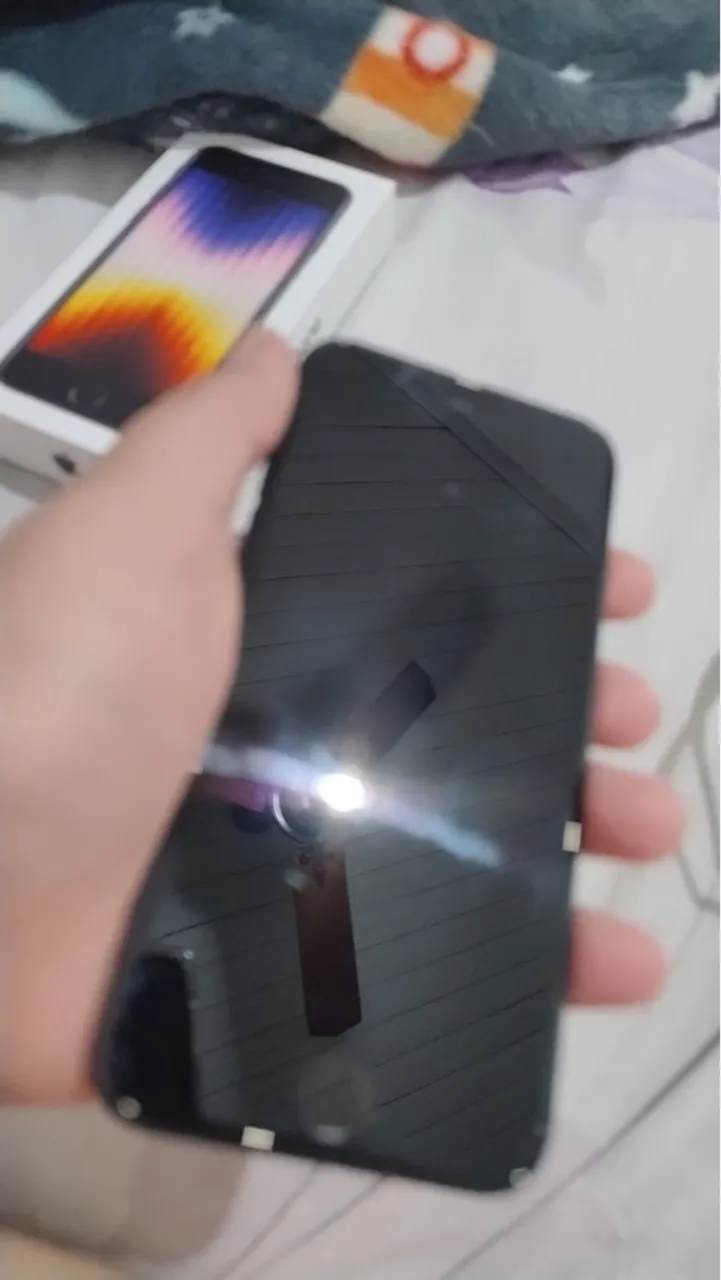 iPhone SE 2022 64 Gigas 13