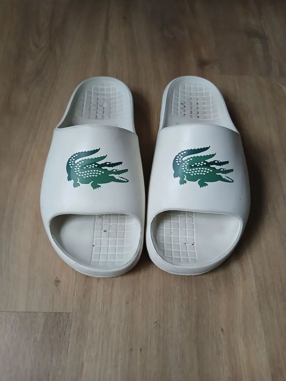 chinelo slide lacoste