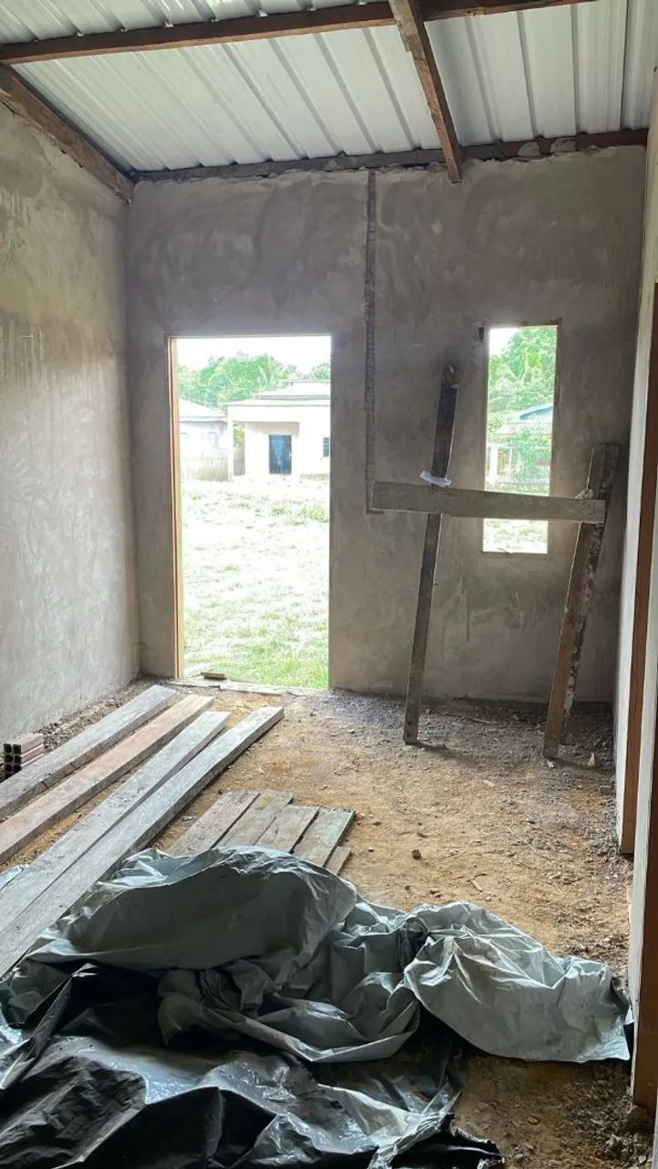 Terreno com casa quase pronta 