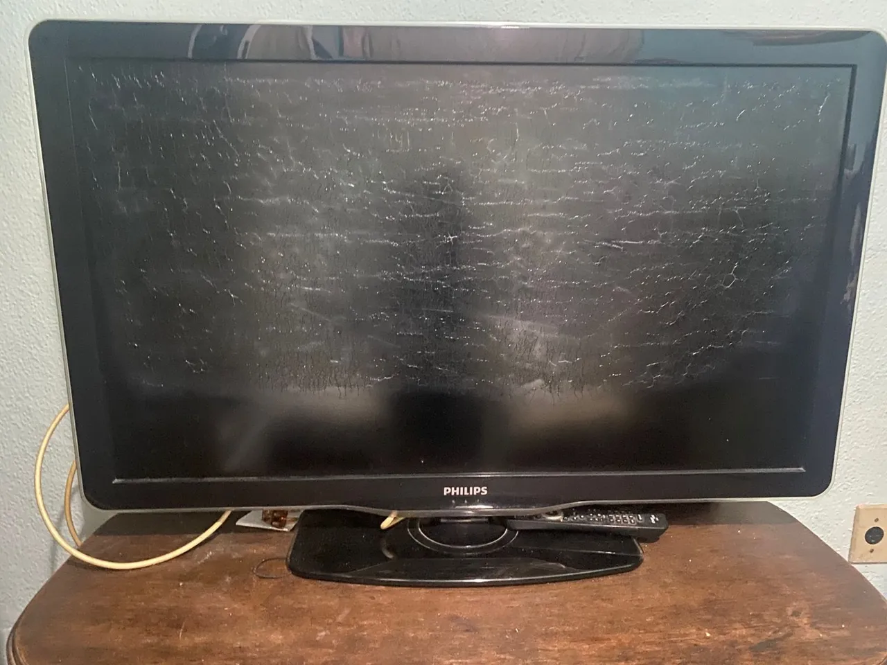 TV Philips 40 polegadas Defeito na tela Pé de vidro