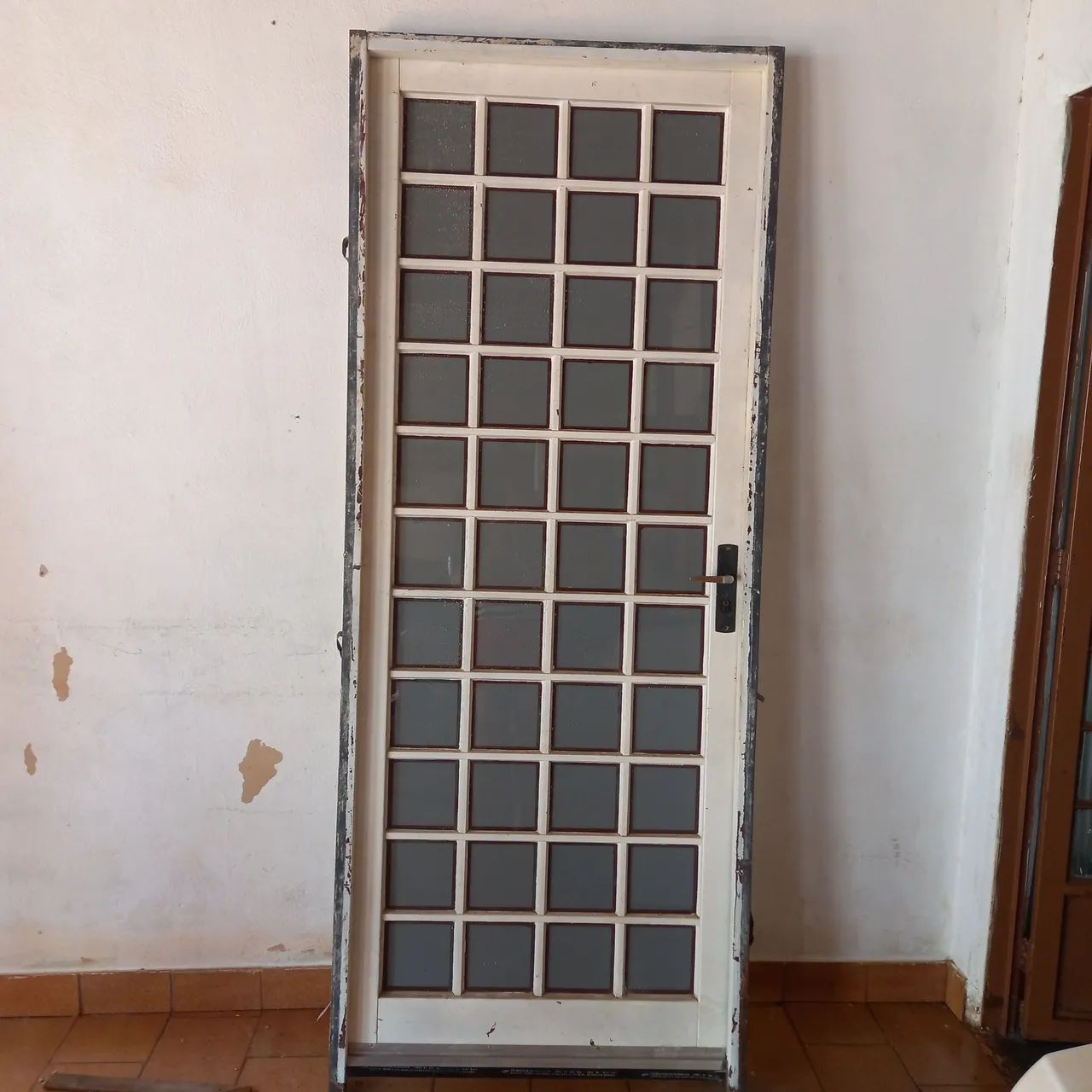 Vendo uma porta de  ferro  64840780065921120