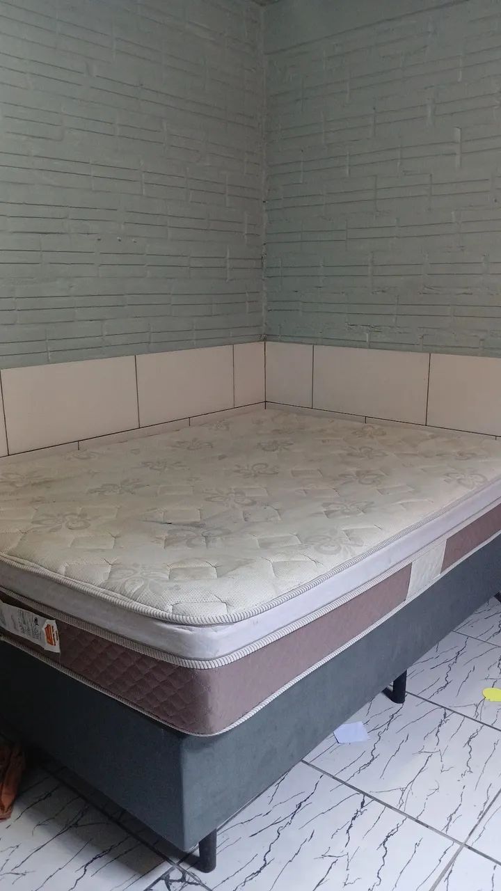 Sofá com puff e cama casal