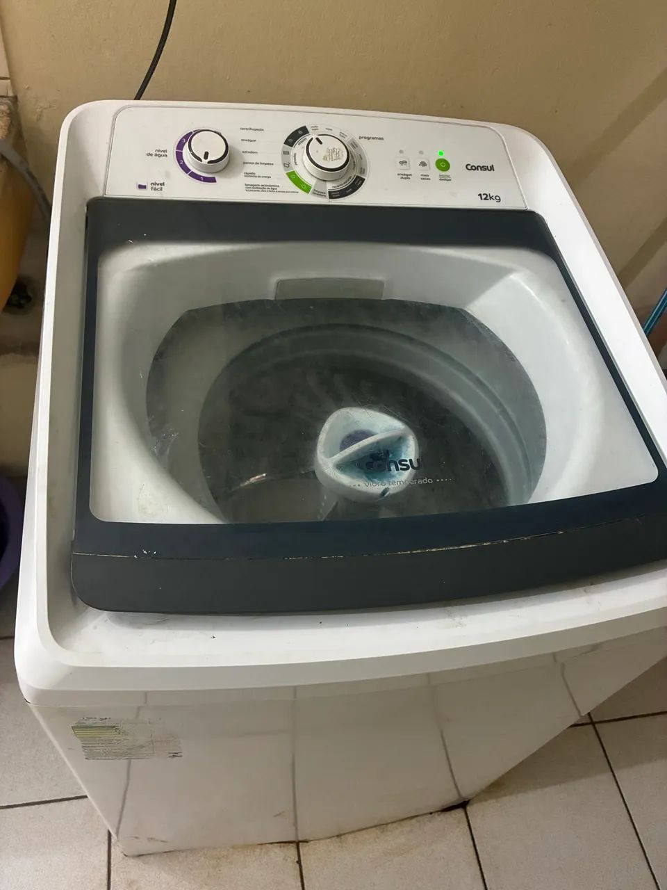 Máquina de lavar com defeito 