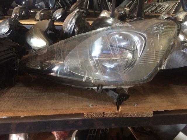Farol esquerdo Honda fit