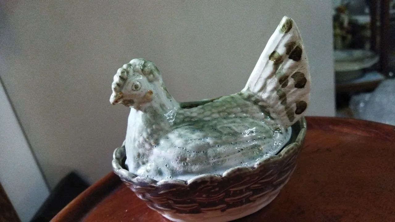 Mantegueira em formato de galinha 