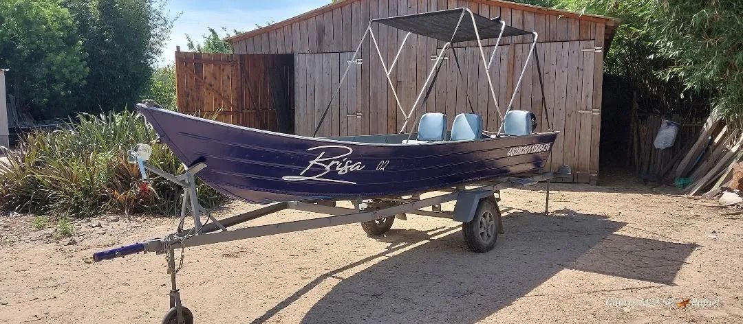 Lancha,barco borda alta