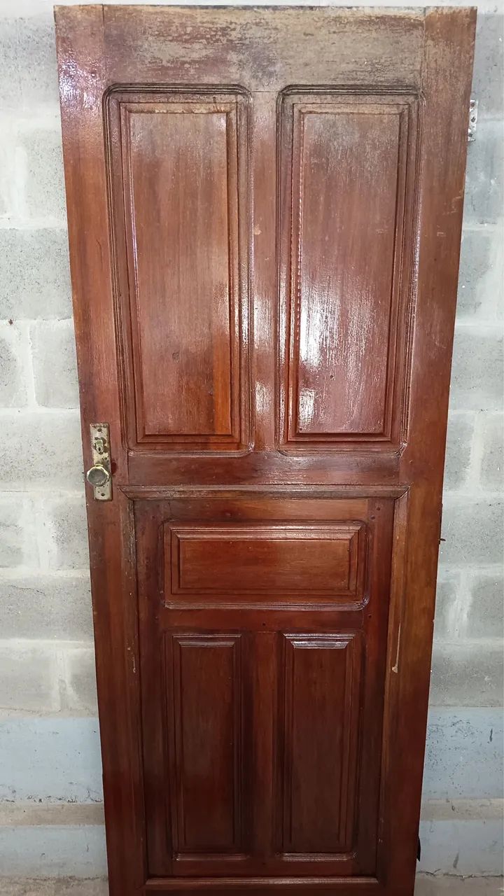 Intact varnished wooden door