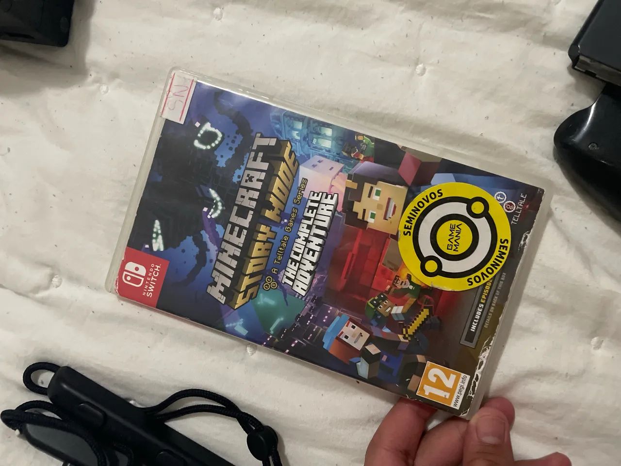 Nintendo Switch com o jogo minecraft story mode