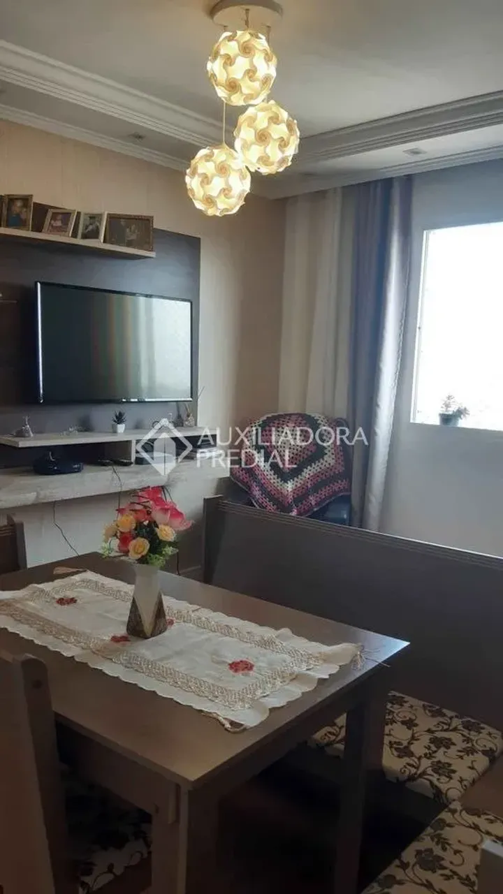 Apartamento à venda no bairro {Neighborhood}, com 54 m² e 2 dormitórios/quartos.