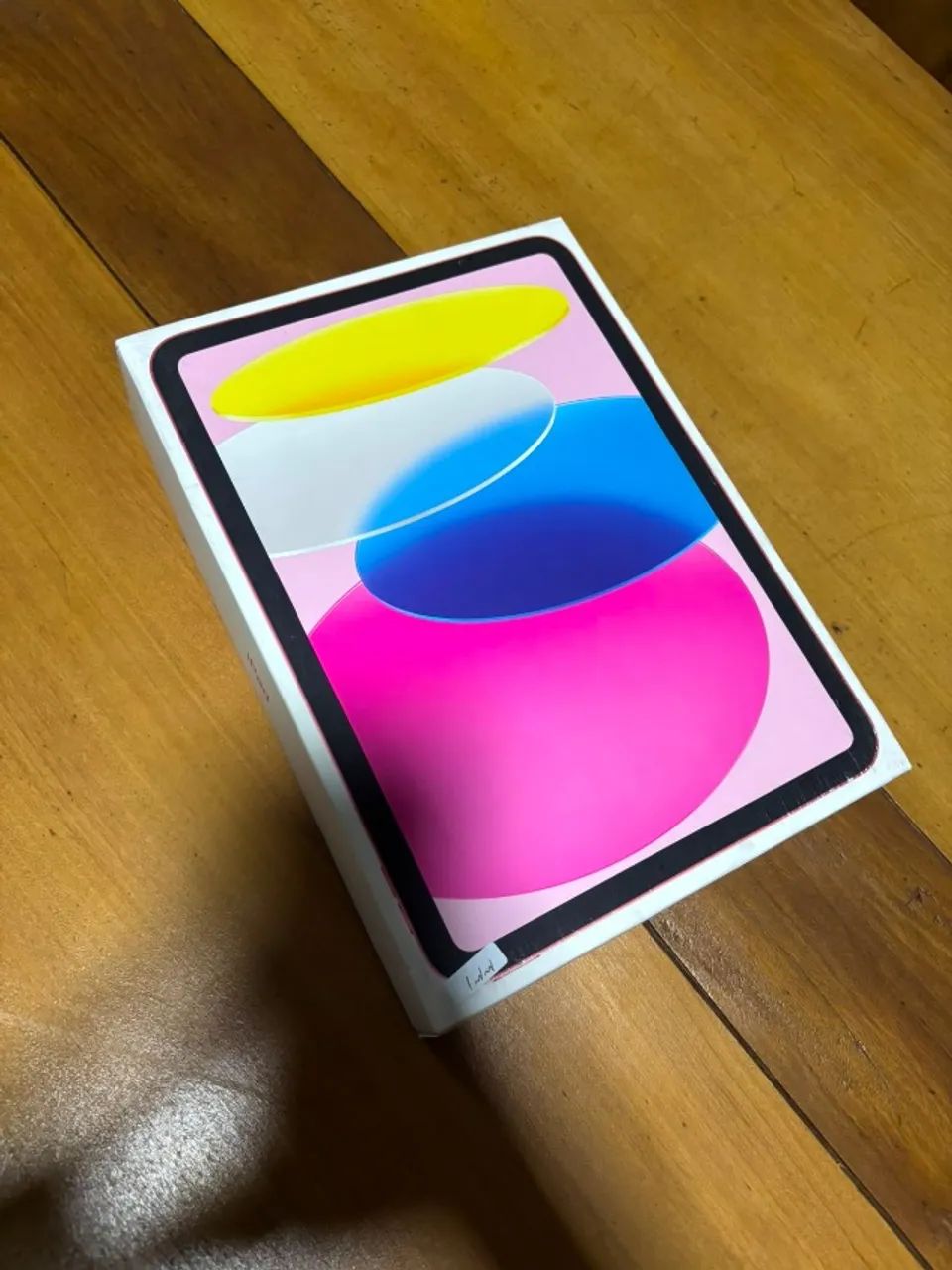 Vendo iPad cor rosa.