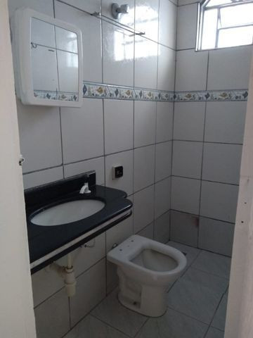 Casa nos fundo para aluguel