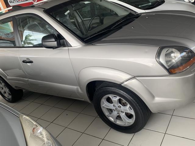 Tucson GLs 2.0 automático de 30.990 por 26.990