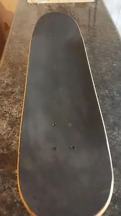 Skate semi novo 